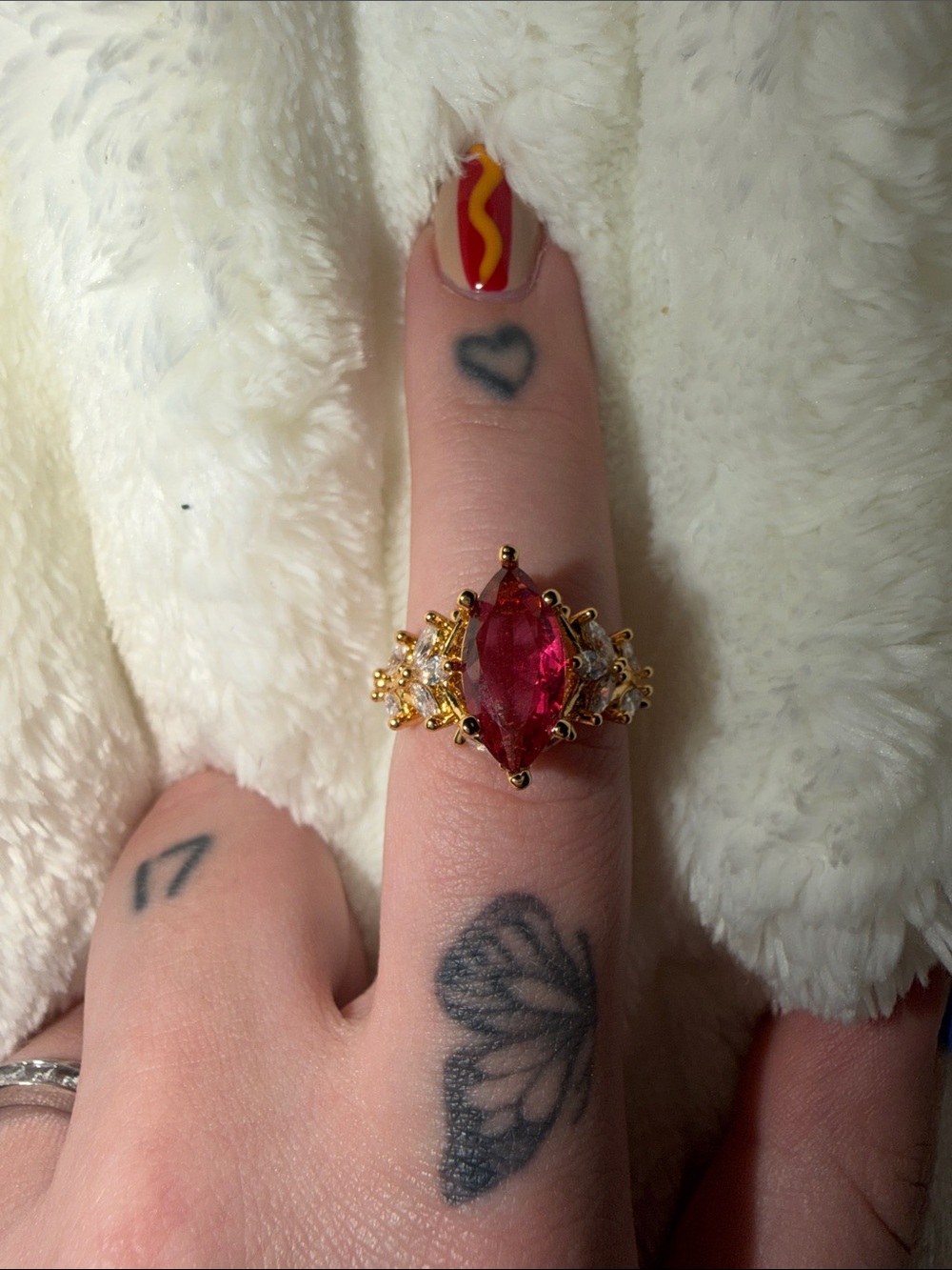 Gold-Tone Ring with Marquise Red Gemstone and Accent Stones
